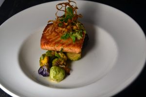 Cape d'Or Salmon with Horseradish Crema, Brussels Sprouts, Crispy Salsify at 1700 Degrees Steakhouse in Harrisburg PA